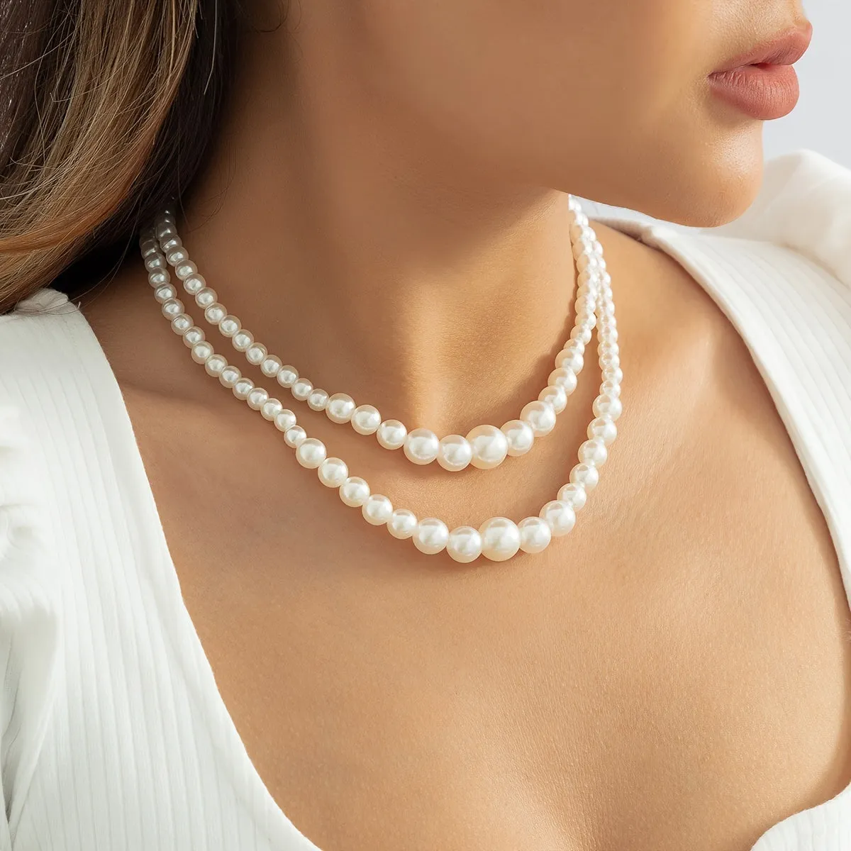 2-Piece Pearl Beading Set: Add a Touch of Elegance to Your Look with These Trendy Jewelry Accessories!