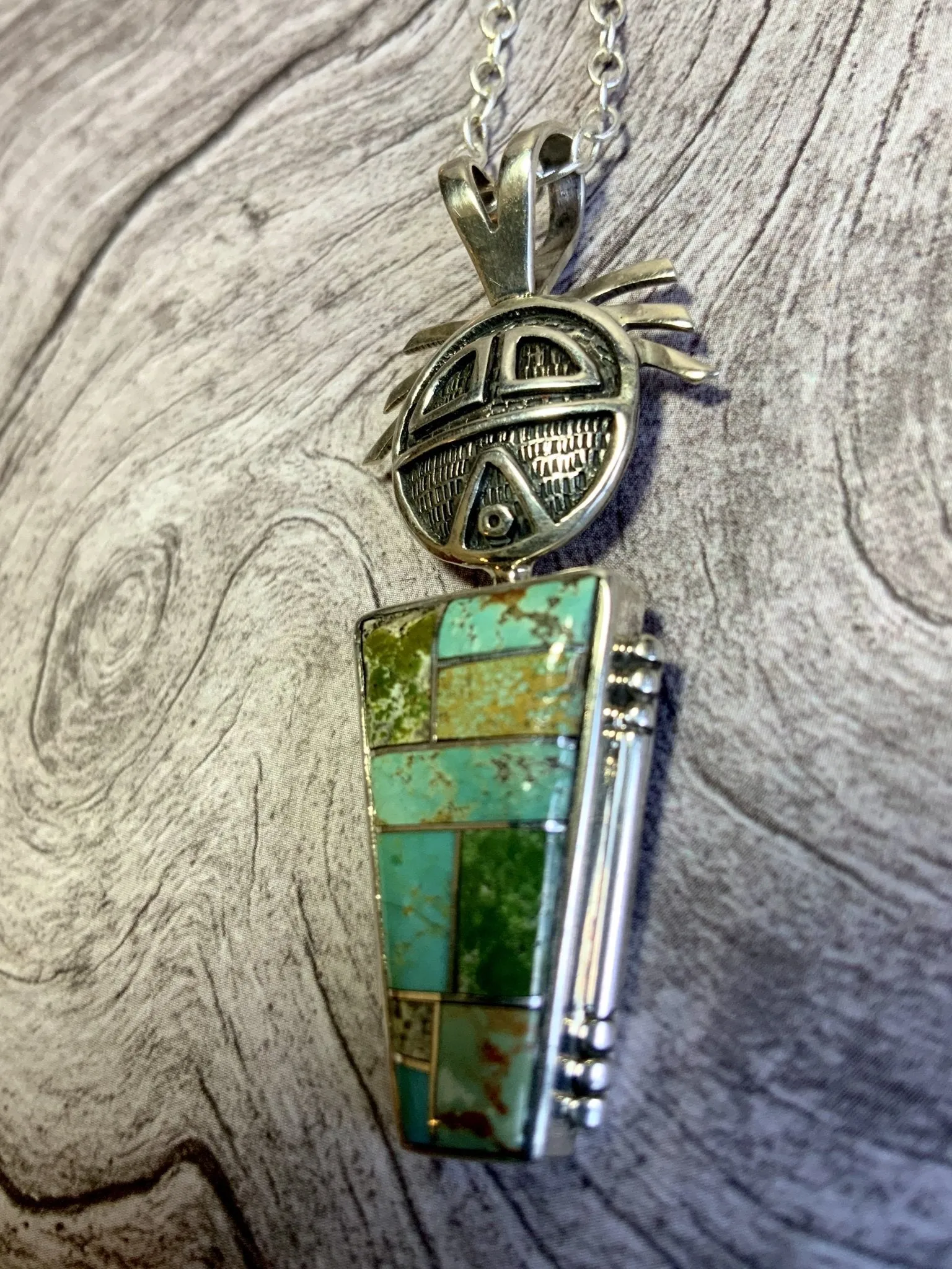 Sun Cloud Kachina Inlay Turquoise Pendant